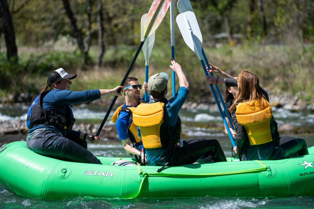 group paddling rapids